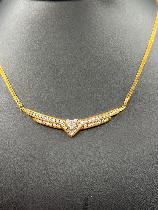 Dije con cadena dama