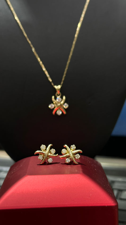 Juego de aretes y dije 6.5 gr 14kts diamantes