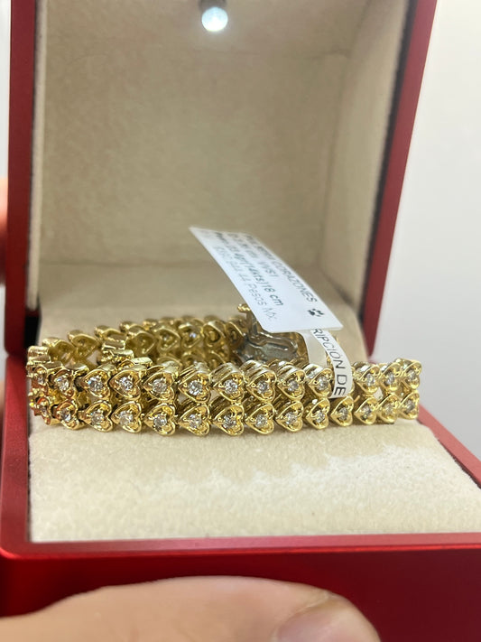 Pulsera corazones oro 14kts